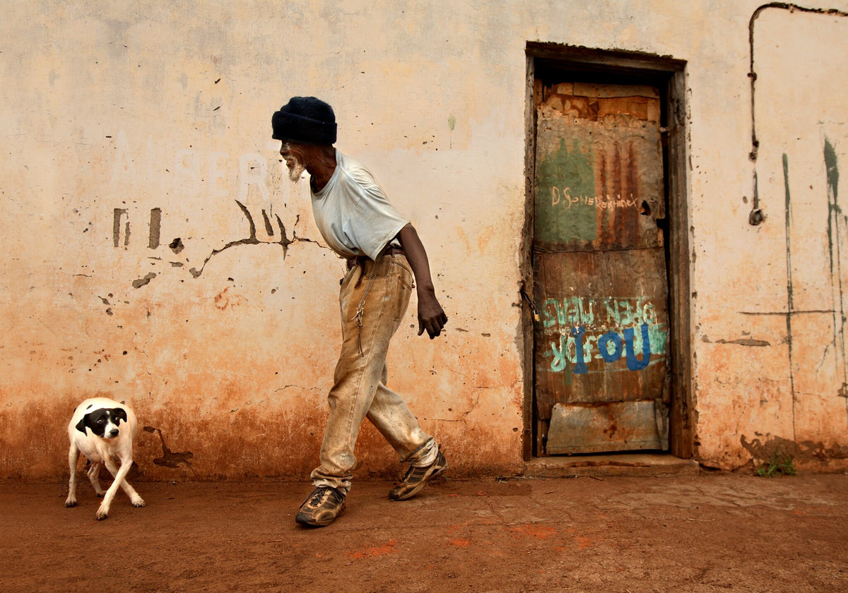 Road to Freedom No.2 by Martin Osner, a documentary portrait of Petrus and his dog