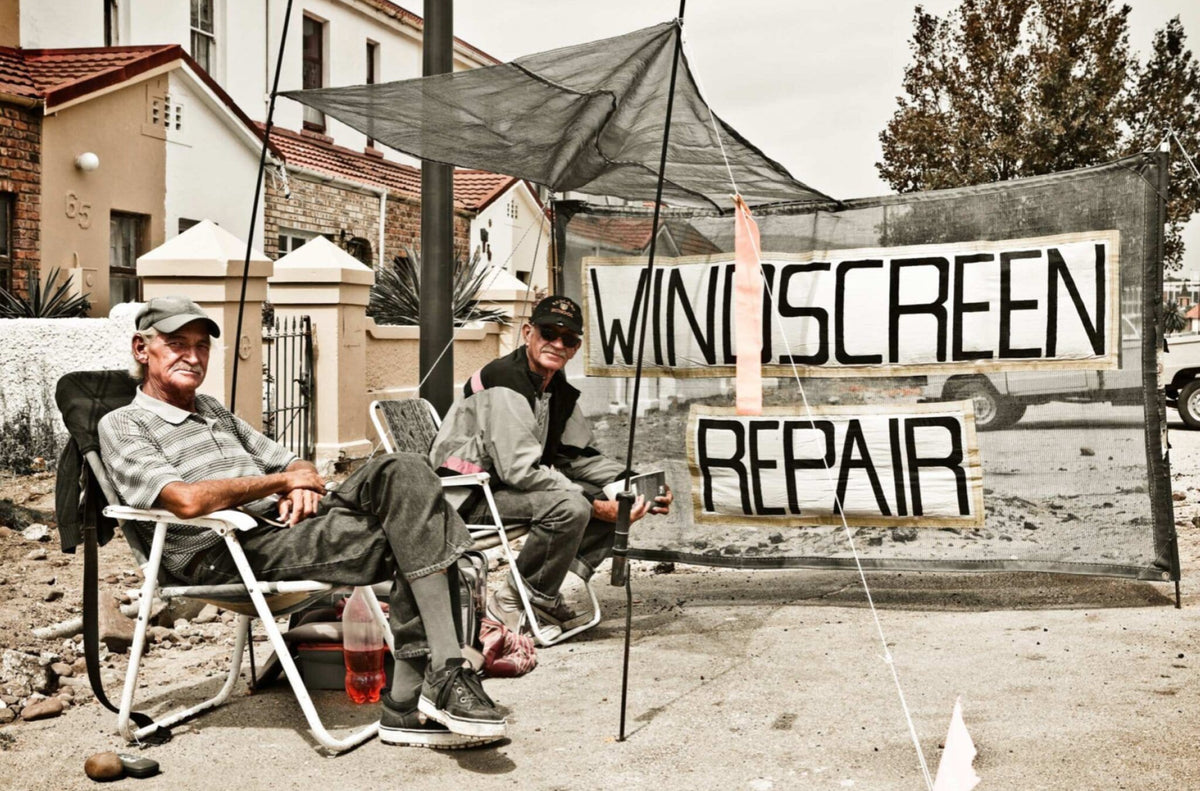 Roadside Windscreen Repair Men by Harry De Zitter, a documentary photograph