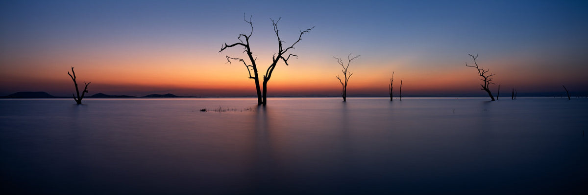 Lake Kariba Sunset No.2, a Kariba print by Koos van der Lende of a sunset silhouette