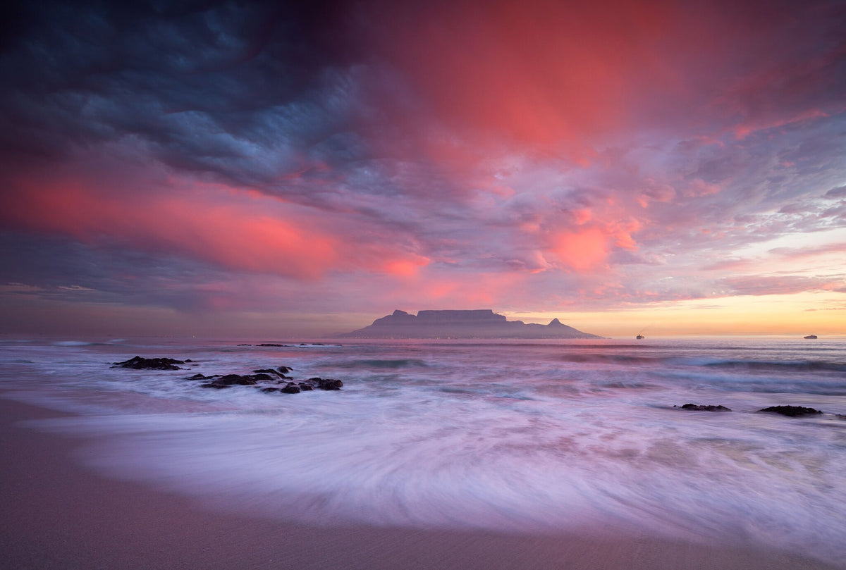 Table Mountain by Hougaard Malan, sunset light across the bay from Blouberg Strand