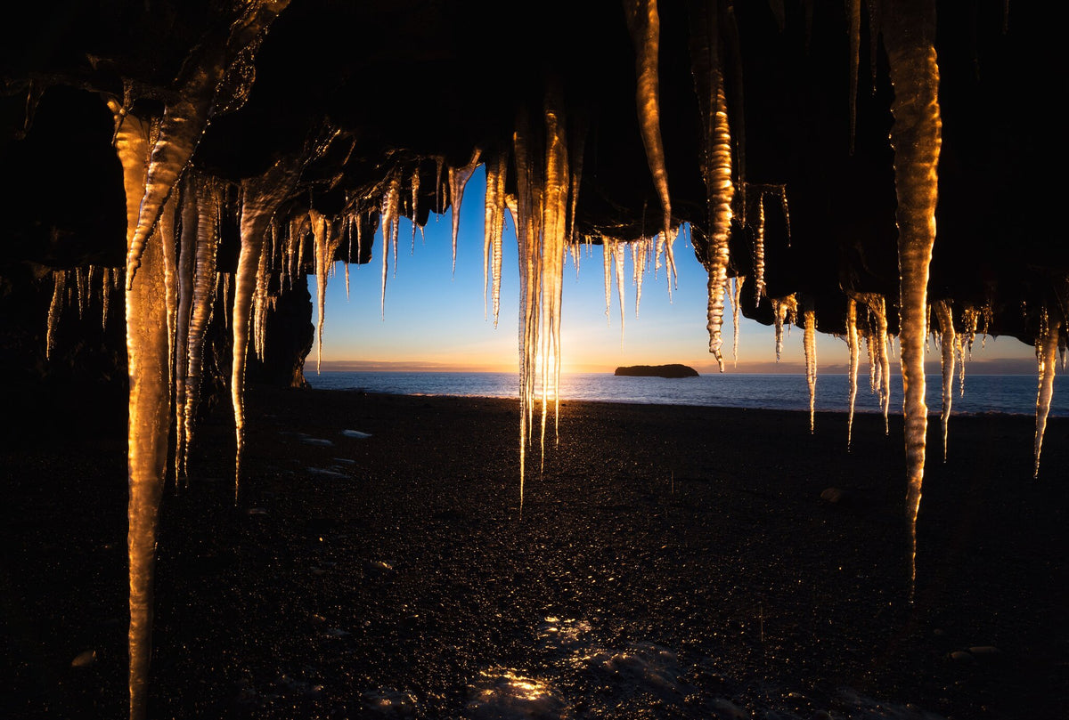 Northern Sun by Hougaard Malan, icicles backlit by the sun